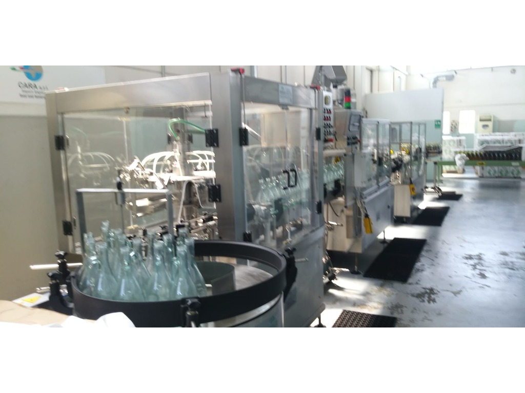Linea di imbottigliamento olio e liquidi di bassa densità in vendita - foto 1