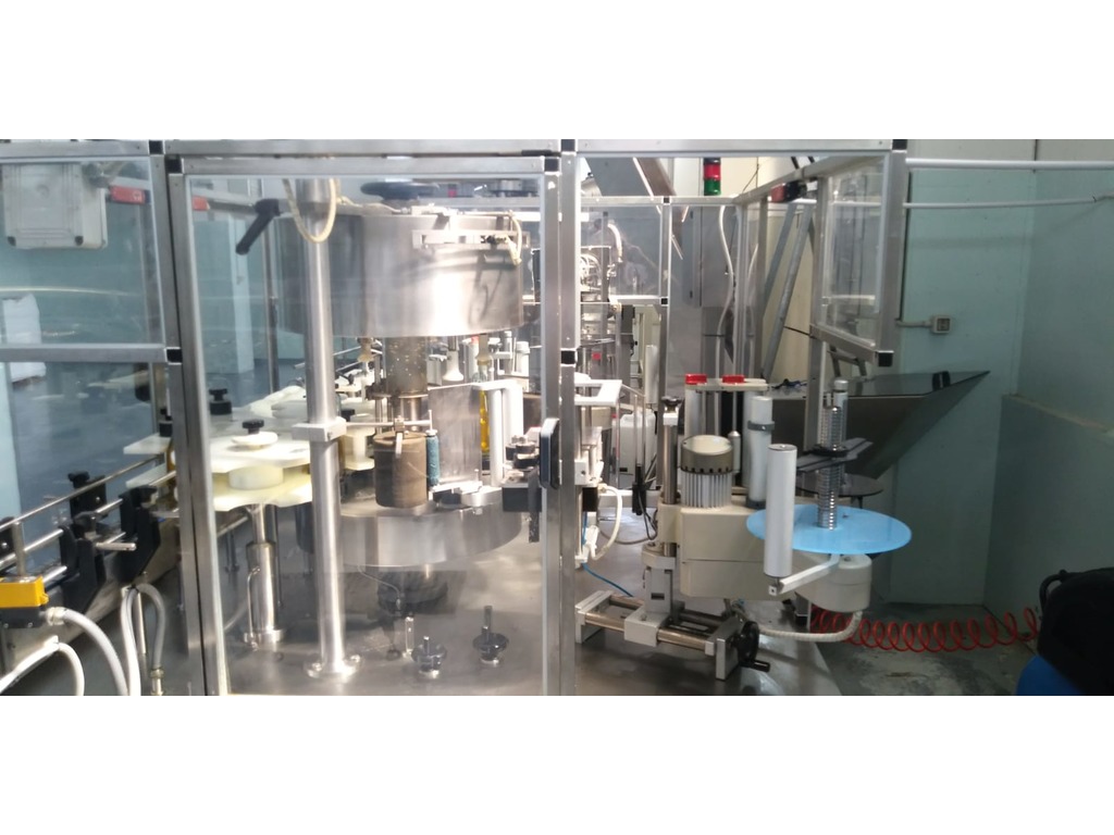 Linea di imbottigliamento olio e liquidi di bassa densità in vendita - foto 5