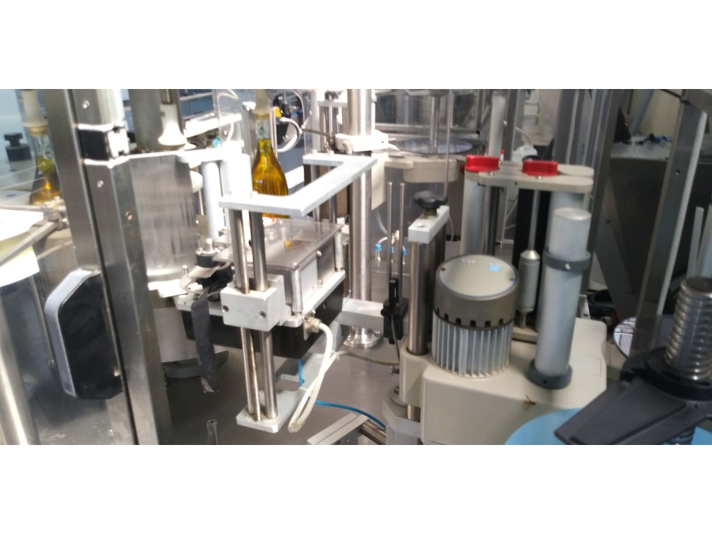 Linea di imbottigliamento olio e liquidi di bassa densità in vendita - foto 7