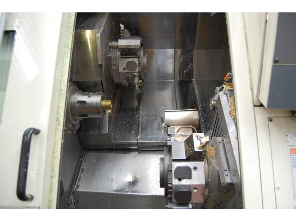 TORNIO CNC A 7 ASSI CON DOPPIA TORRETTA COMPLETO DI CARICABARRE USATO - OKUMA LT 10 MY in vendita - foto 2
